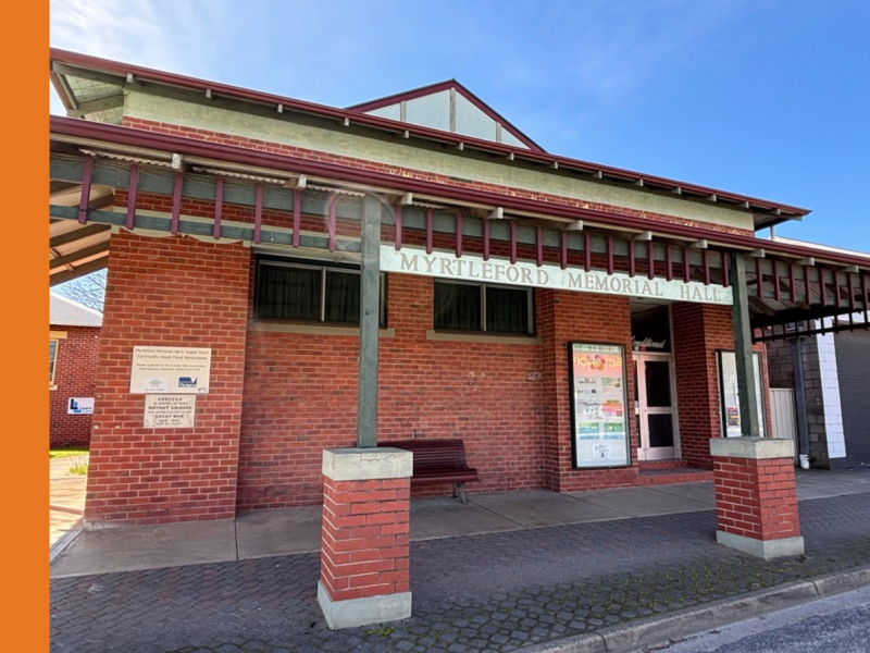 A red brick hall with a sign stating that it is Myrtleford Memorial Hall.