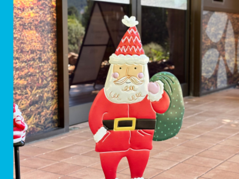 A small garden ornament of Santa positioned out the front of the Council Office in Bright.
