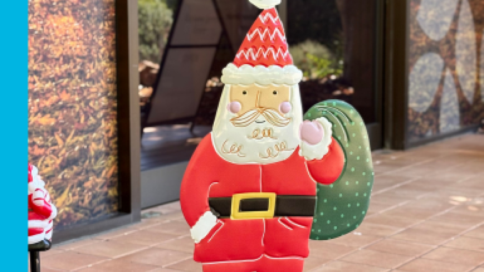 A small garden ornament of Santa positioned out the front of the Council Office in Bright.